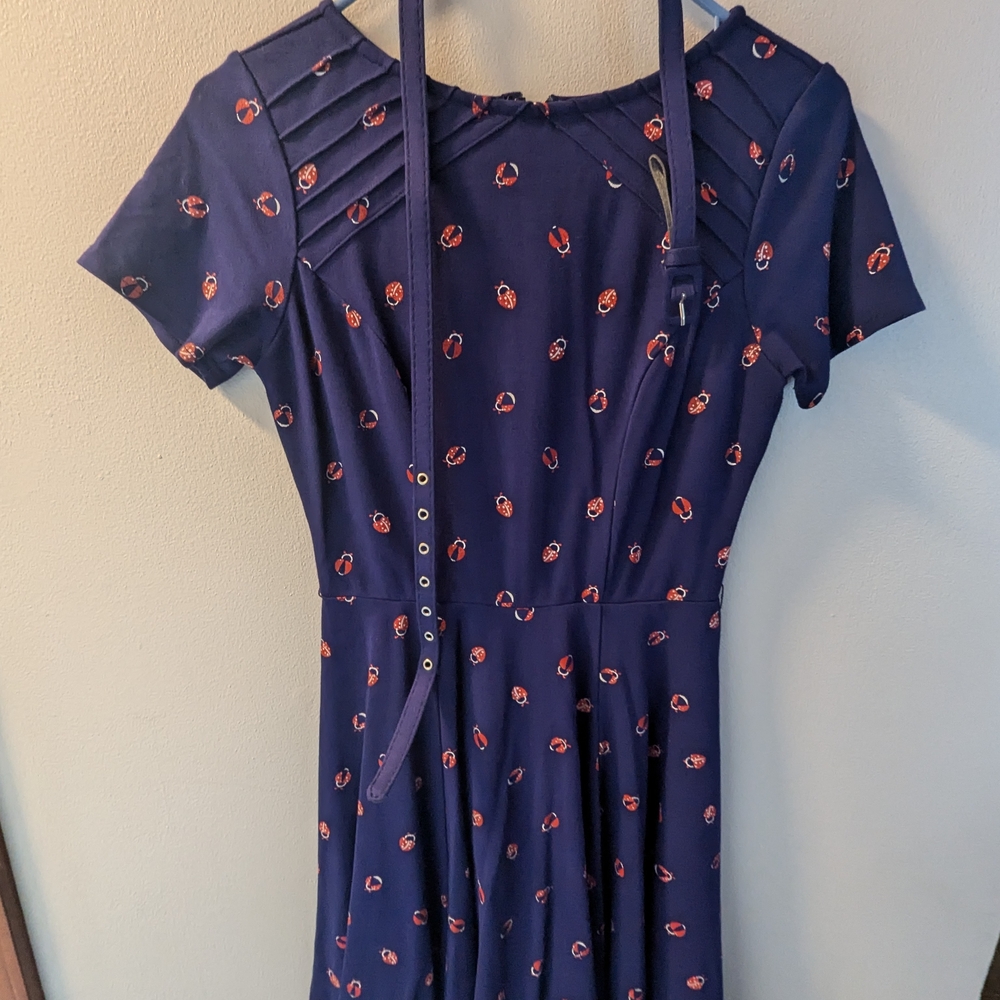 Chic Blue Dress with Red Floral Pattern